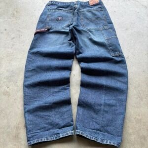 Vintage baggy USPA carpenter jeans with a‎ crazy bamboo weave southpole style